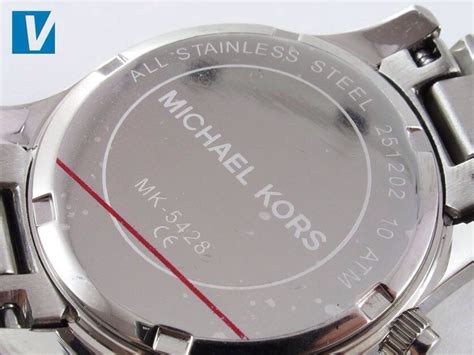 how to find a fake michael kors watch|michael kors watch serial number look.